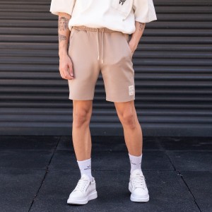Pantaloncini beige oversize in tessuto da sub da uomo