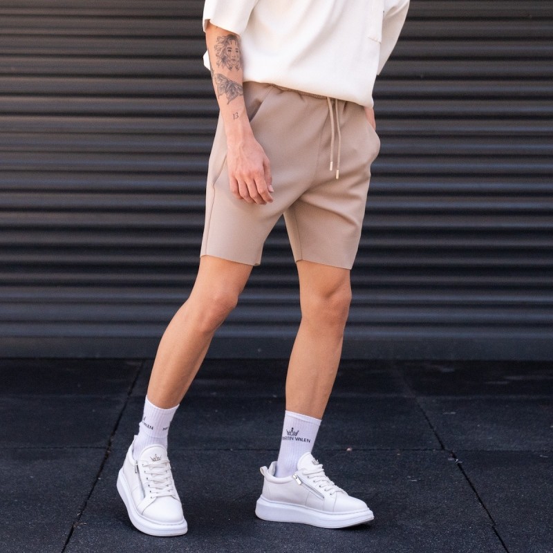 Pantaloncini beige oversize in tessuto da sub da uomo