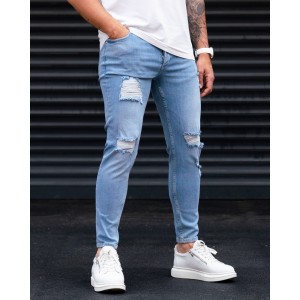Ripped Slim Fit Jeans in Washed Blue