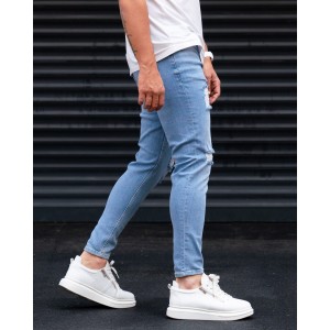 Ripped Slim Fit Jeans in Washed Blue