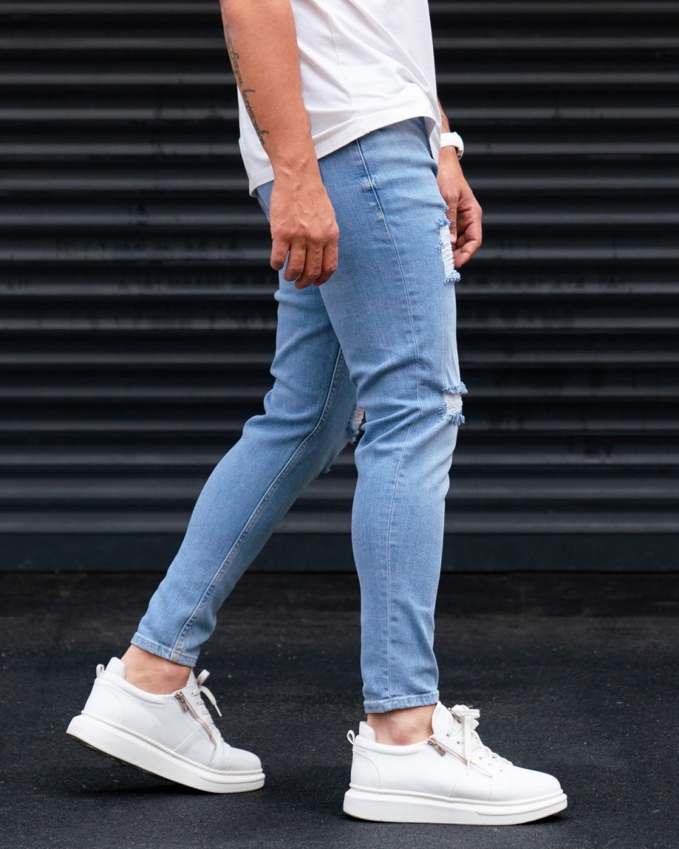 Ripped Slim Fit Jeans in Washed Blue