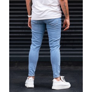 Ripped Slim Fit Jeans in Washed Blue