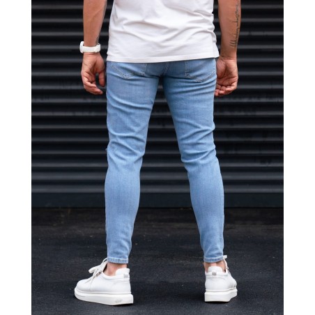 Ripped Slim Fit Jeans in Washed Blue