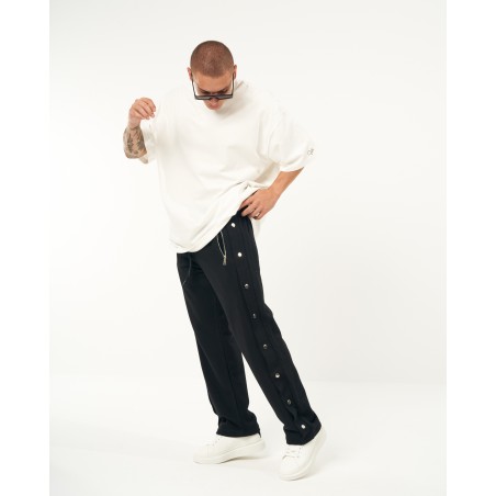 Jogger folgado preto oversized com botões de pressão | Martin Valen