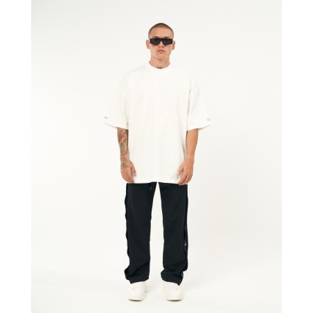 Jogger folgado preto oversized com botões de pressão | Martin Valen