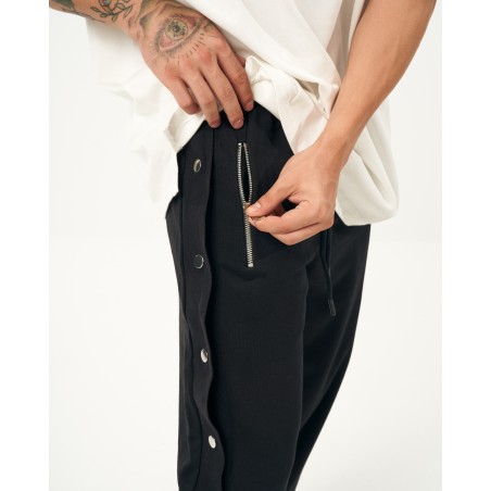 Jogger folgado preto oversized com botões de pressão | Martin Valen