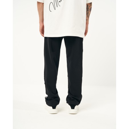 Jogger folgado preto oversized com botões de pressão | Martin Valen