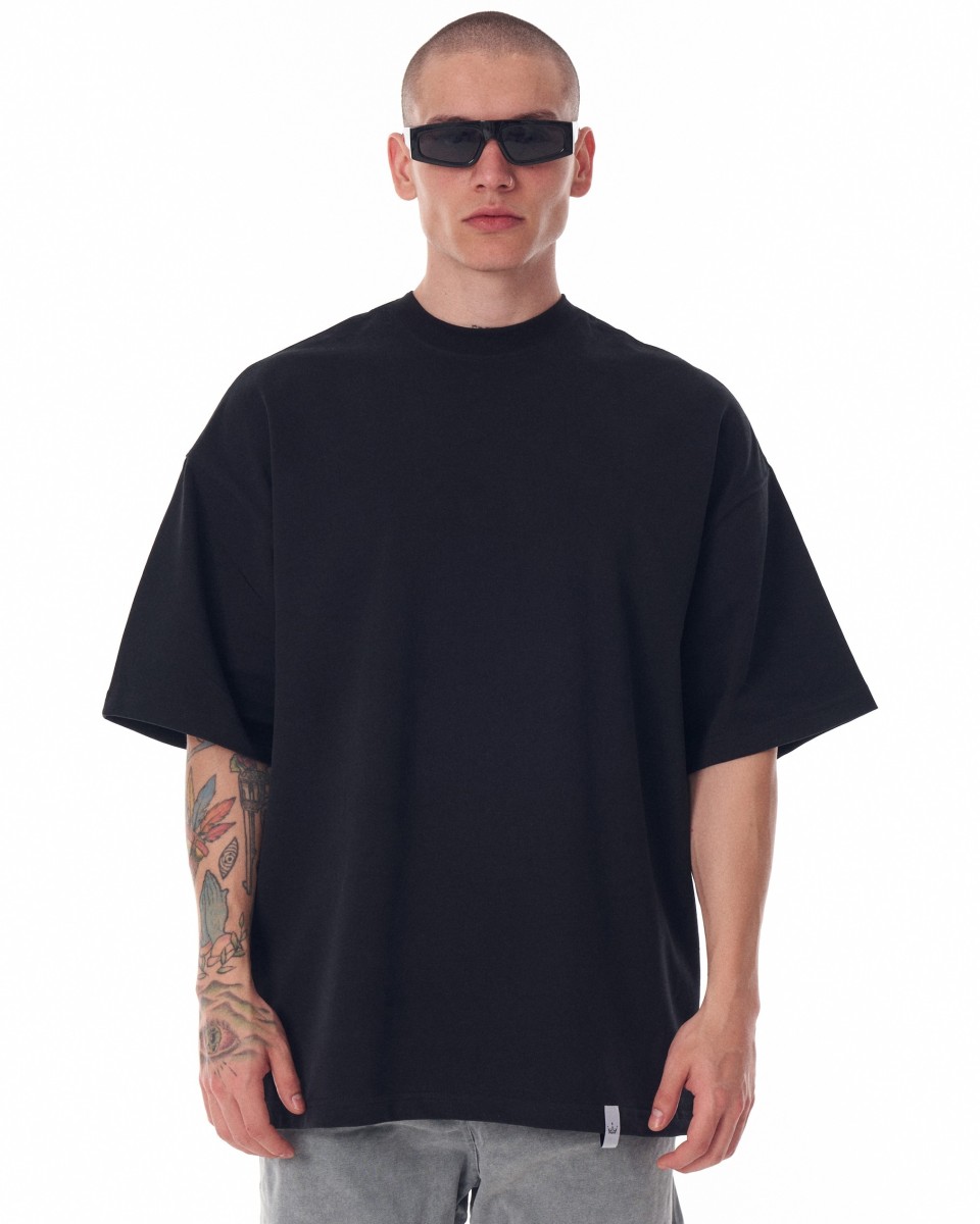 Schwarzes, schweres T-Shirt mit übergroßem Siebdruck auf der Rückseite für Herren | Martin Valen 2