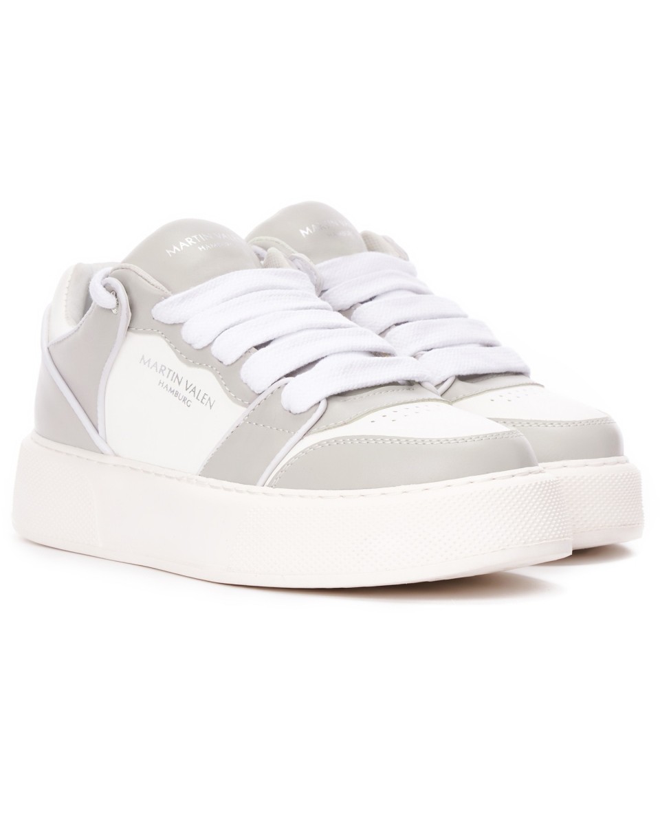 Zapatillas bicolor grises y blancas 2